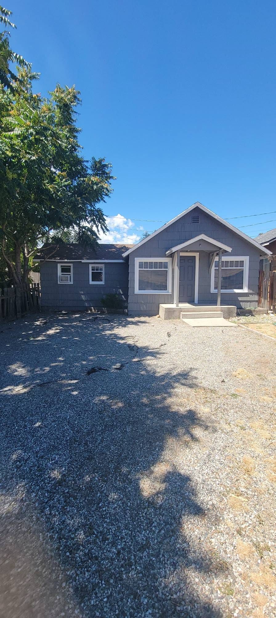 Grey house exterior, shown on Cerda-Fied Painting LLC's Facebook page.